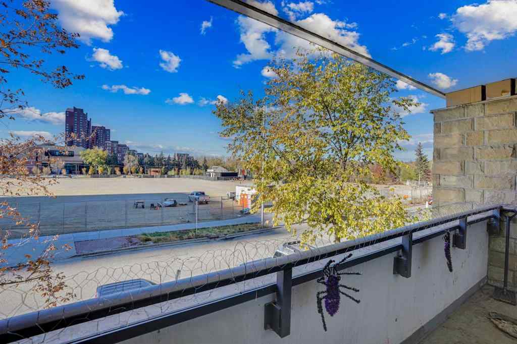 MLS® A2265532 - Unit #205 128 2 Street SW in Chinatown Calgary, Residential