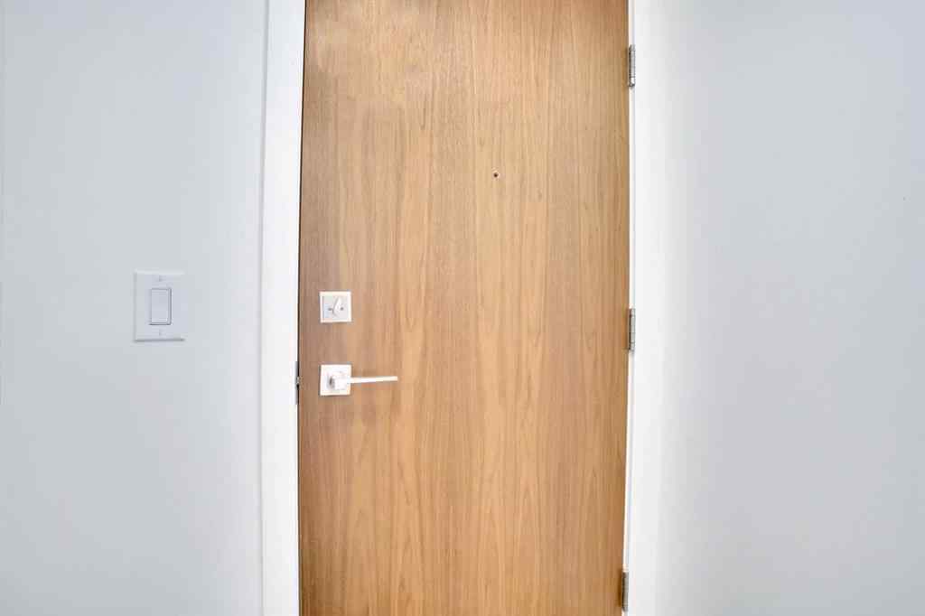 MLS® A2265532 - Unit #205 128 2 Street SW in Chinatown Calgary, Residential