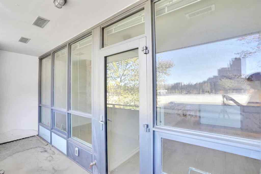 MLS® A2265532 - Unit #205 128 2 Street SW in Chinatown Calgary, Residential