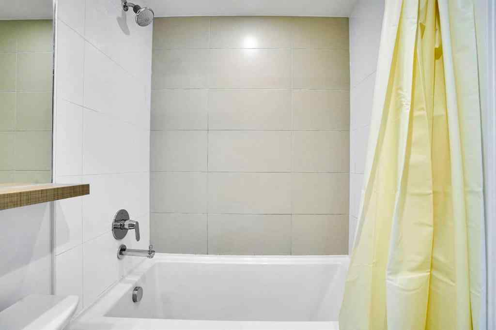 MLS® A2265532 - Unit #205 128 2 Street SW in Chinatown Calgary, Residential