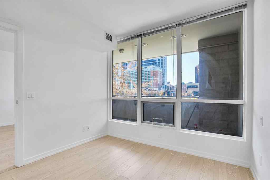 MLS® A2265532 - Unit #205 128 2 Street SW in Chinatown Calgary, Residential