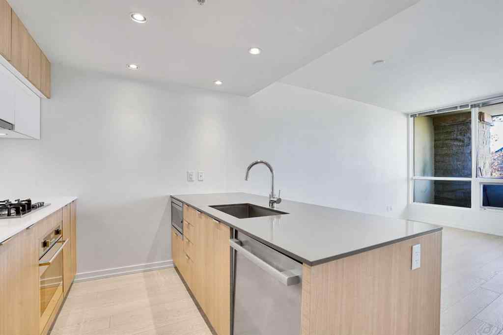 MLS® A2265532 - Unit #205 128 2 Street SW in Chinatown Calgary, Residential