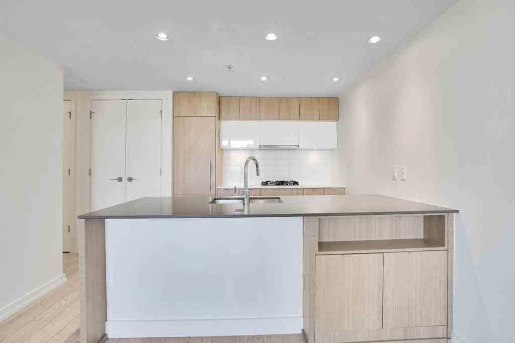 MLS® A2265532 - Unit #205 128 2 Street SW in Chinatown Calgary, Residential