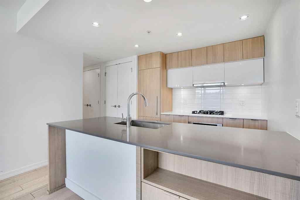 MLS® A2265532 - Unit #205 128 2 Street SW in Chinatown Calgary, Residential