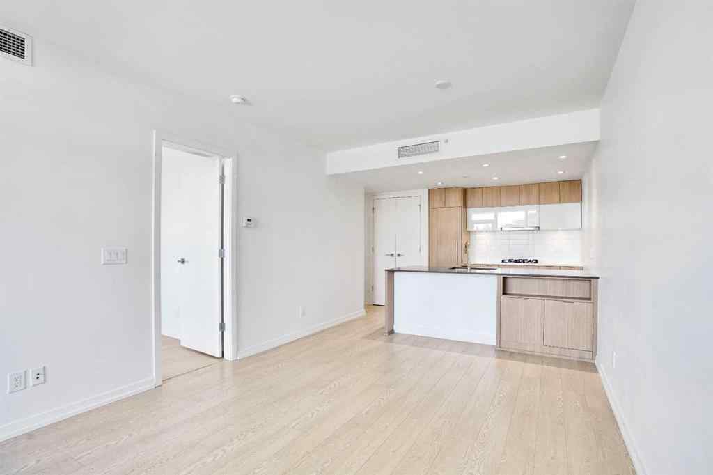 MLS® A2265532 - Unit #205 128 2 Street SW in Chinatown Calgary, Residential