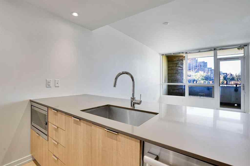 MLS® A2265532 - Unit #205 128 2 Street SW in Chinatown Calgary, Residential