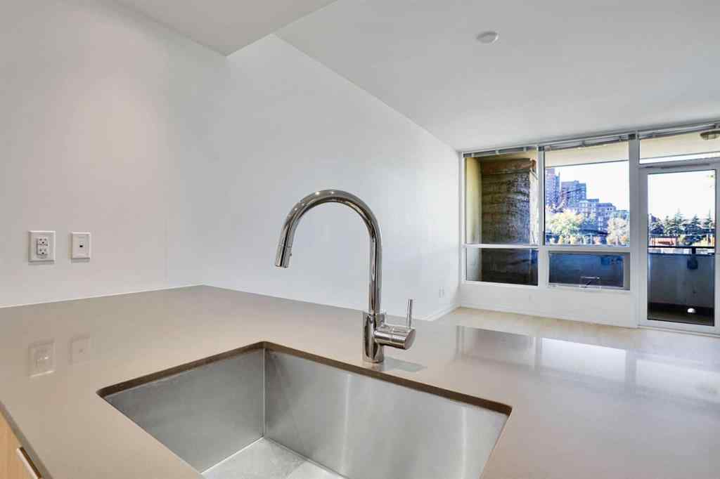 MLS® A2265532 - Unit #205 128 2 Street SW in Chinatown Calgary, Residential