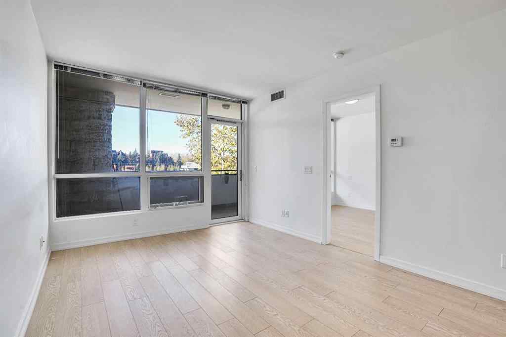 MLS® A2265532 - Unit #205 128 2 Street SW in Chinatown Calgary, Residential