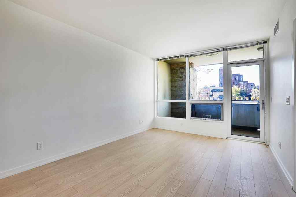 MLS® A2265532 - Unit #205 128 2 Street SW in Chinatown Calgary, Residential