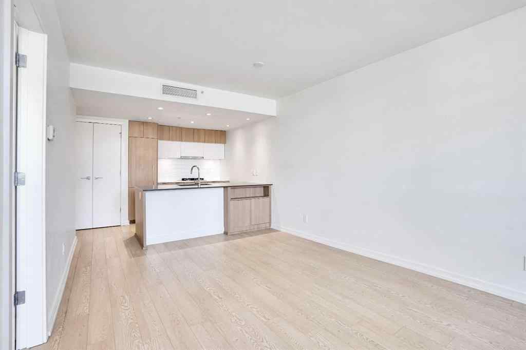 MLS® A2265532 - Unit #205 128 2 Street SW in Chinatown Calgary, Residential