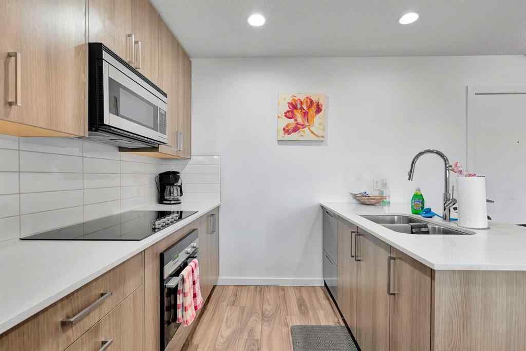 MLS® A2265543 - Unit #206 1629 38 Street SW in Rosscarrock Calgary, Residential