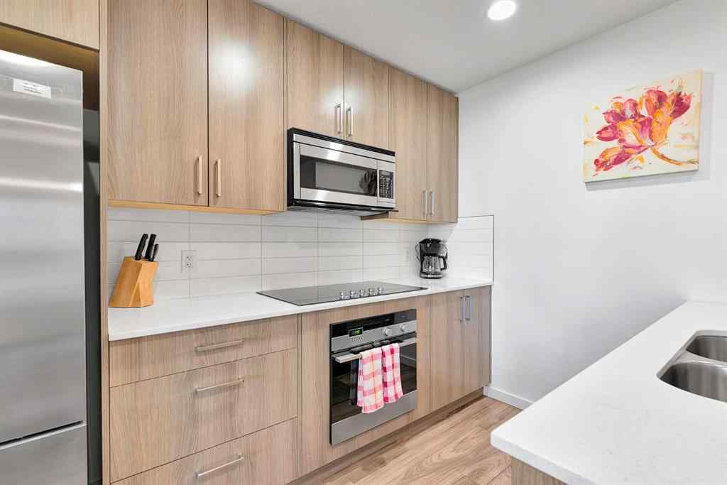 MLS® A2265543 - Unit #206 1629 38 Street SW in Rosscarrock Calgary, Residential