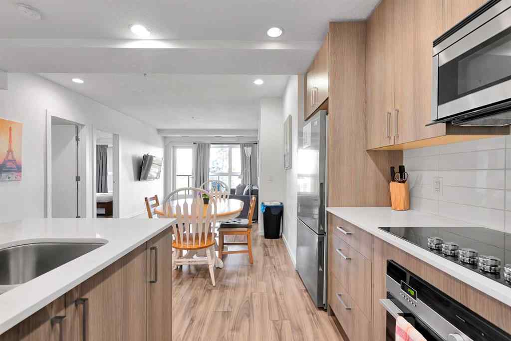 MLS® A2265543 - Unit #206 1629 38 Street SW in Rosscarrock Calgary, Residential