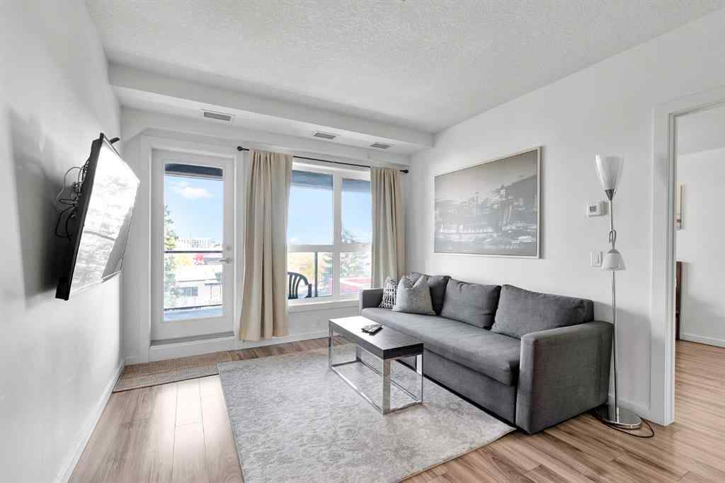MLS® A2265543 - Unit #206 1629 38 Street SW in Rosscarrock Calgary, Residential