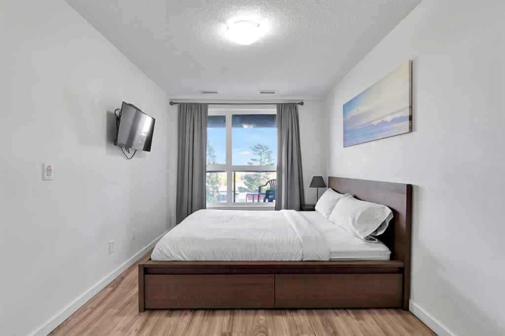 MLS® A2265543 - Unit #206 1629 38 Street SW in Rosscarrock Calgary, Residential