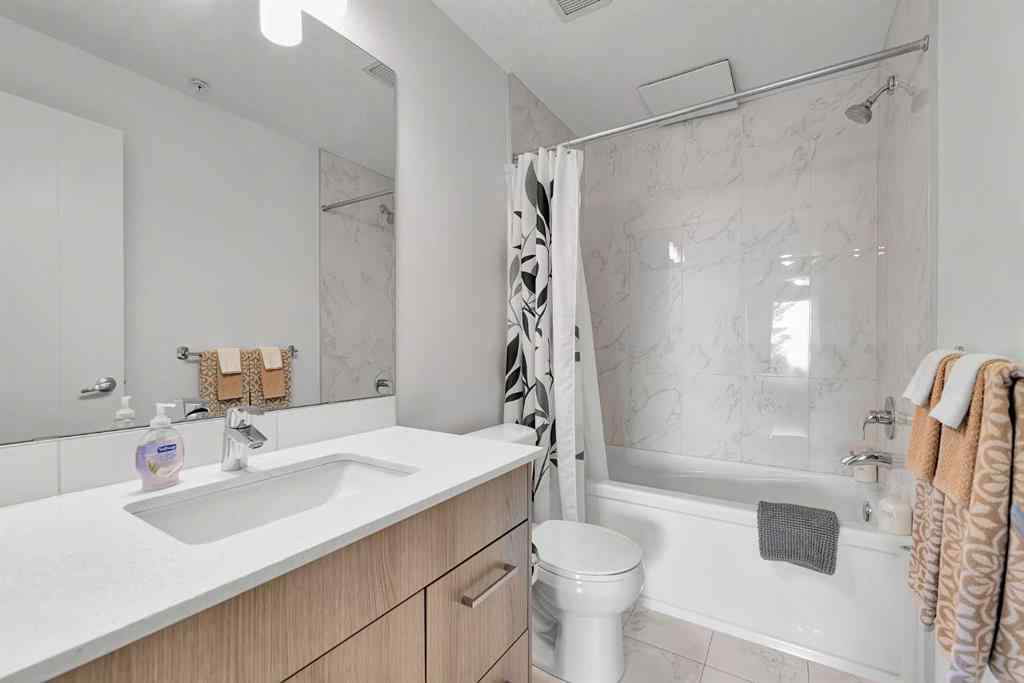 MLS® A2265543 - Unit #206 1629 38 Street SW in Rosscarrock Calgary, Residential