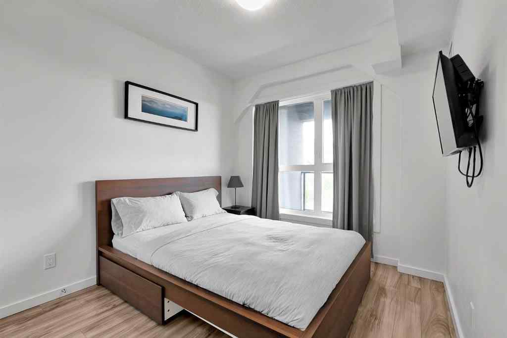 MLS® A2265543 - Unit #206 1629 38 Street SW in Rosscarrock Calgary, Residential