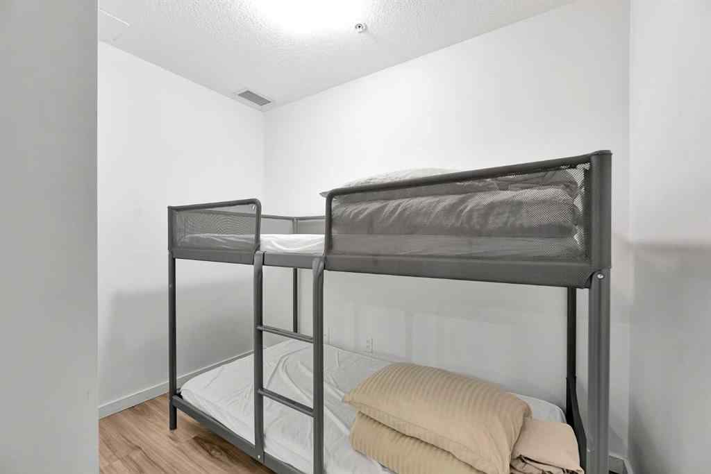 MLS® A2265543 - Unit #206 1629 38 Street SW in Rosscarrock Calgary, Residential