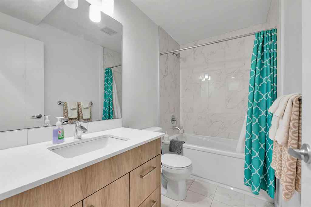 MLS® A2265543 - Unit #206 1629 38 Street SW in Rosscarrock Calgary, Residential