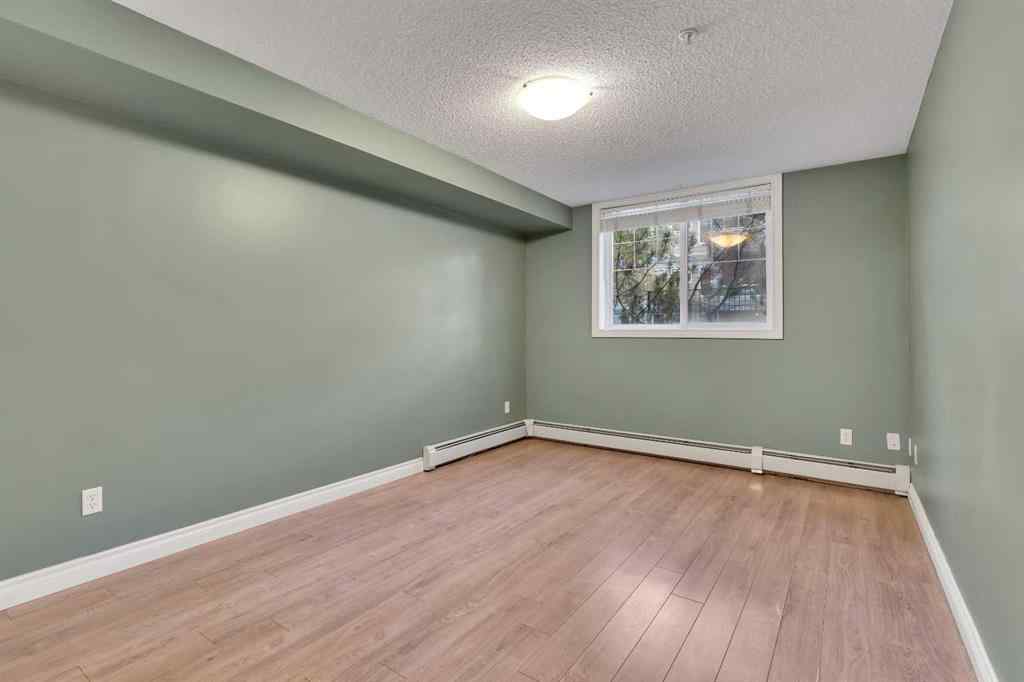 MLS® A2265545 - Unit #106 2411 Erlton Road SW in Erlton Calgary, Residential