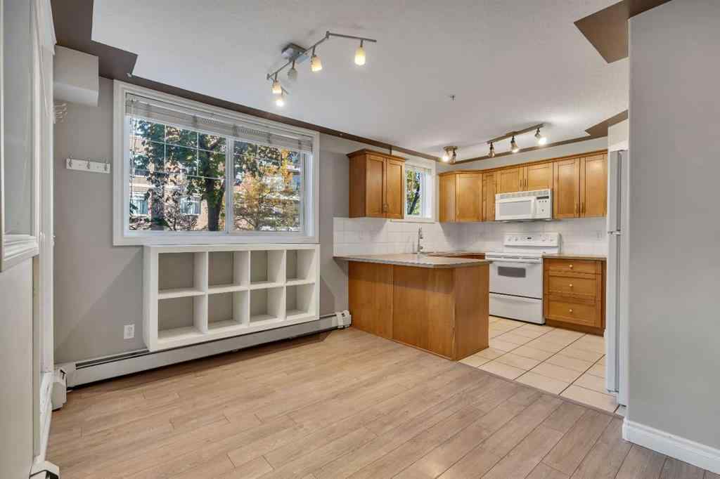 MLS® A2265545 - Unit #106 2411 Erlton Road SW in Erlton Calgary, Residential