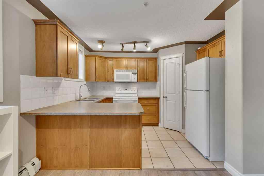 MLS® A2265545 - Unit #106 2411 Erlton Road SW in Erlton Calgary, Residential