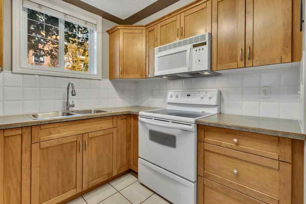 MLS® A2265545 - Unit #106 2411 Erlton Road SW in Erlton Calgary, Residential