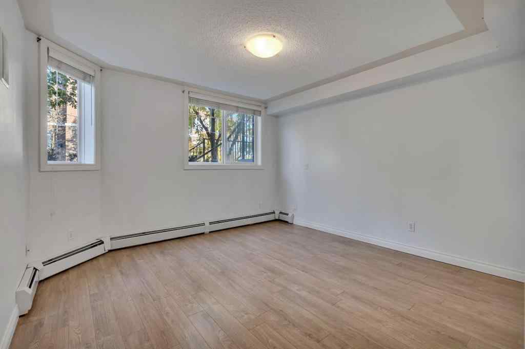 MLS® A2265545 - Unit #106 2411 Erlton Road SW in Erlton Calgary, Residential