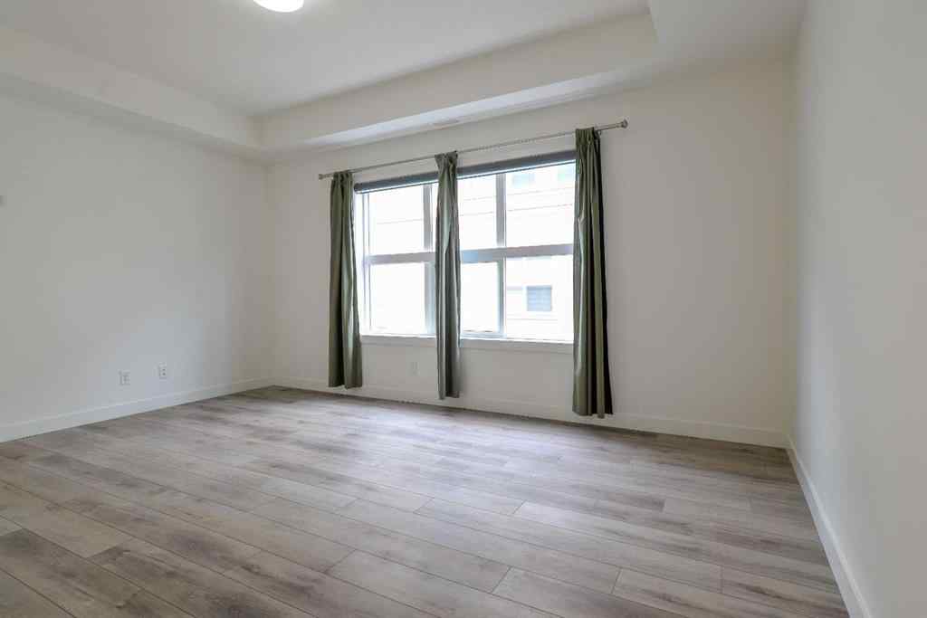 MLS® A2265552 - 145 Spring Creek Common SW in Springbank Hill Calgary, Residential