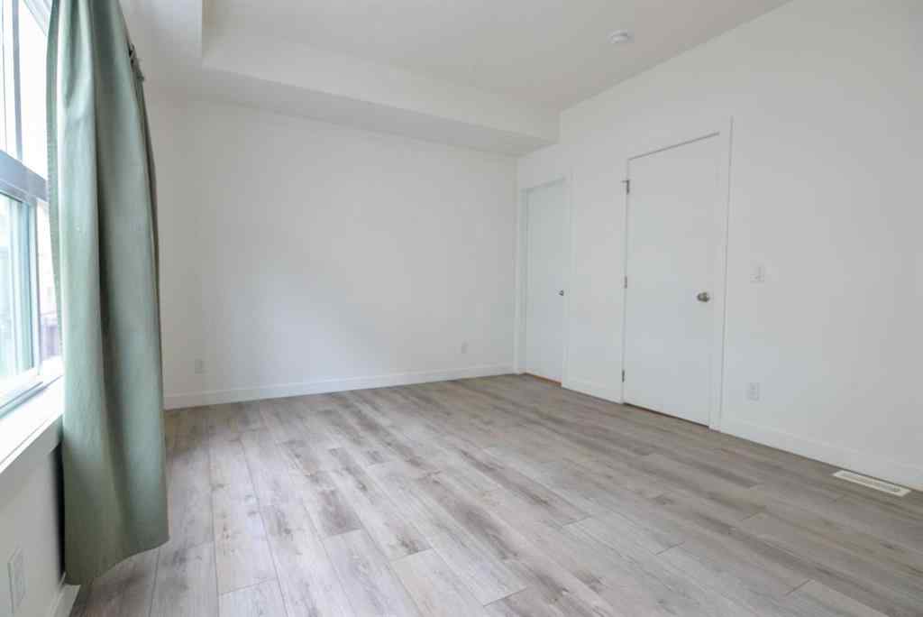 MLS® A2265552 - 145 Spring Creek Common SW in Springbank Hill Calgary, Residential