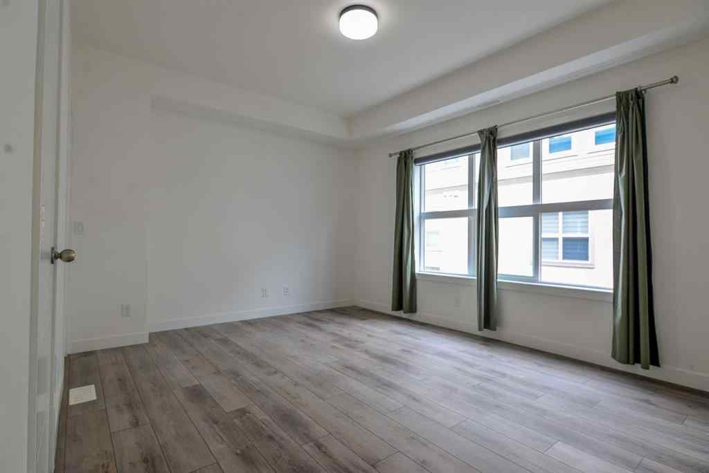 MLS® A2265552 - 145 Spring Creek Common SW in Springbank Hill Calgary, Residential