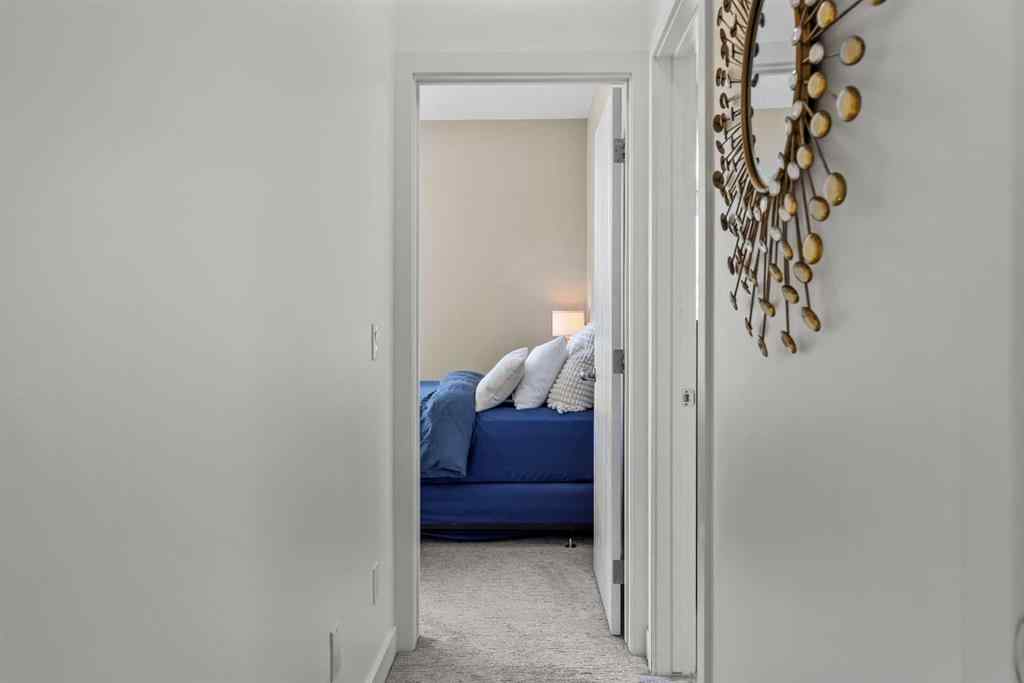 MLS® A2265553 - Unit #302 102 Stewart Creek Rise  in Three Sisters Canmore, Residential