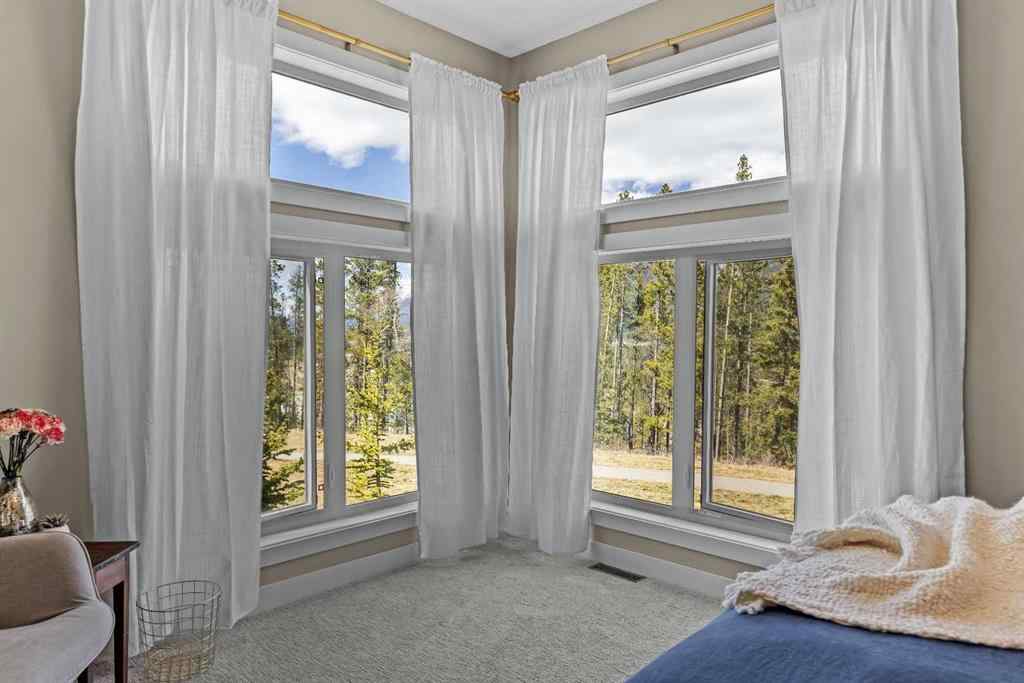 MLS® A2265553 - Unit #302 102 Stewart Creek Rise  in Three Sisters Canmore, Residential