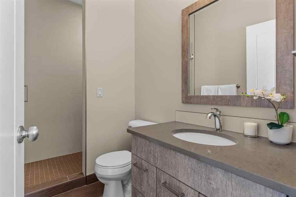 MLS® A2265553 - Unit #302 102 Stewart Creek Rise  in Three Sisters Canmore, Residential