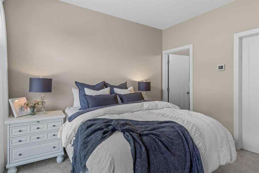 MLS® A2265553 - Unit #302 102 Stewart Creek Rise  in Three Sisters Canmore, Residential