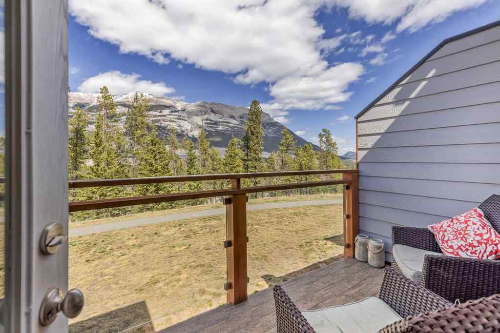 MLS® A2265553 - Unit #302 102 Stewart Creek Rise  in Three Sisters Canmore, Residential