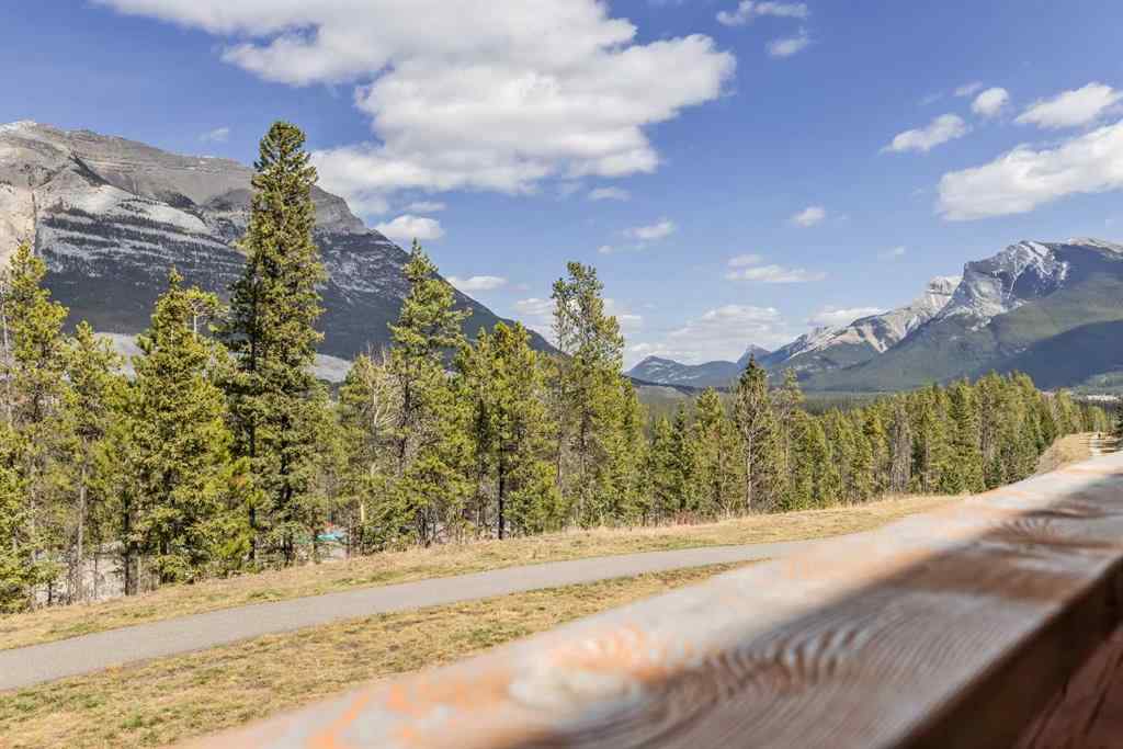 MLS® A2265553 - Unit #302 102 Stewart Creek Rise  in Three Sisters Canmore, Residential