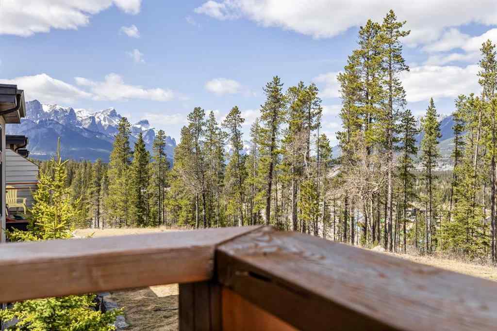 MLS® A2265553 - Unit #302 102 Stewart Creek Rise  in Three Sisters Canmore, Residential