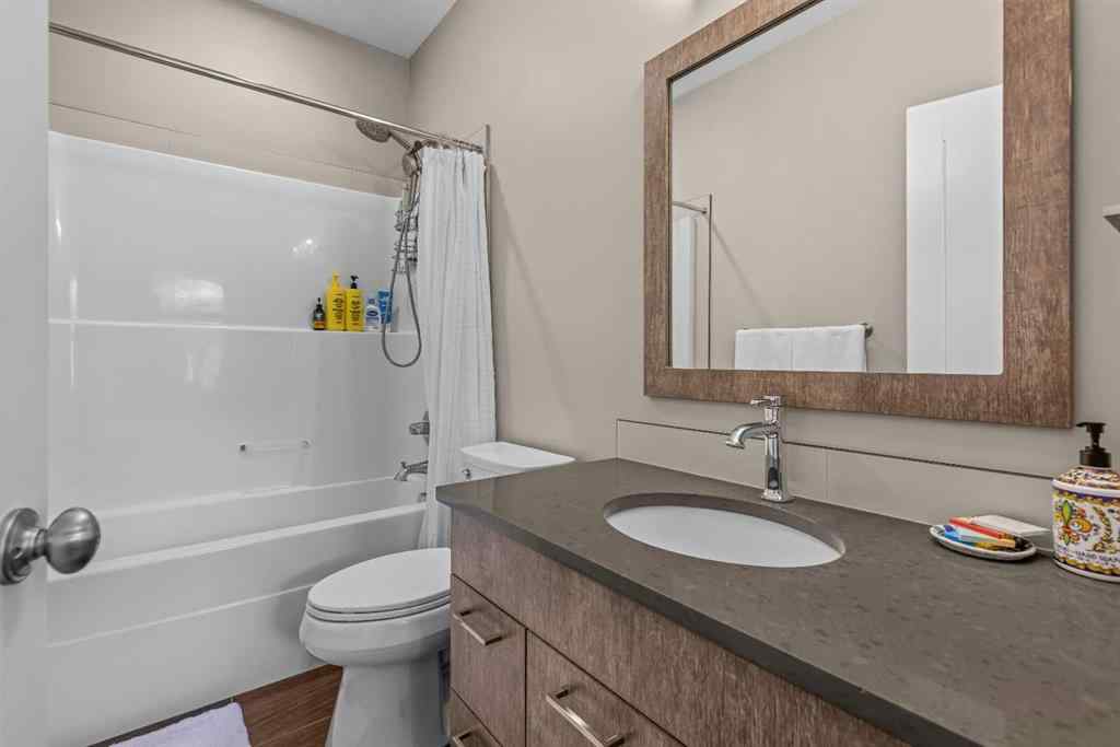 MLS® A2265553 - Unit #302 102 Stewart Creek Rise  in Three Sisters Canmore, Residential