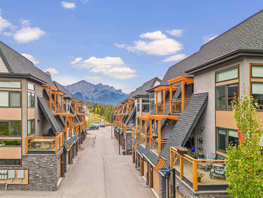MLS® A2265553 - Unit #302 102 Stewart Creek Rise  in Three Sisters Canmore, Residential