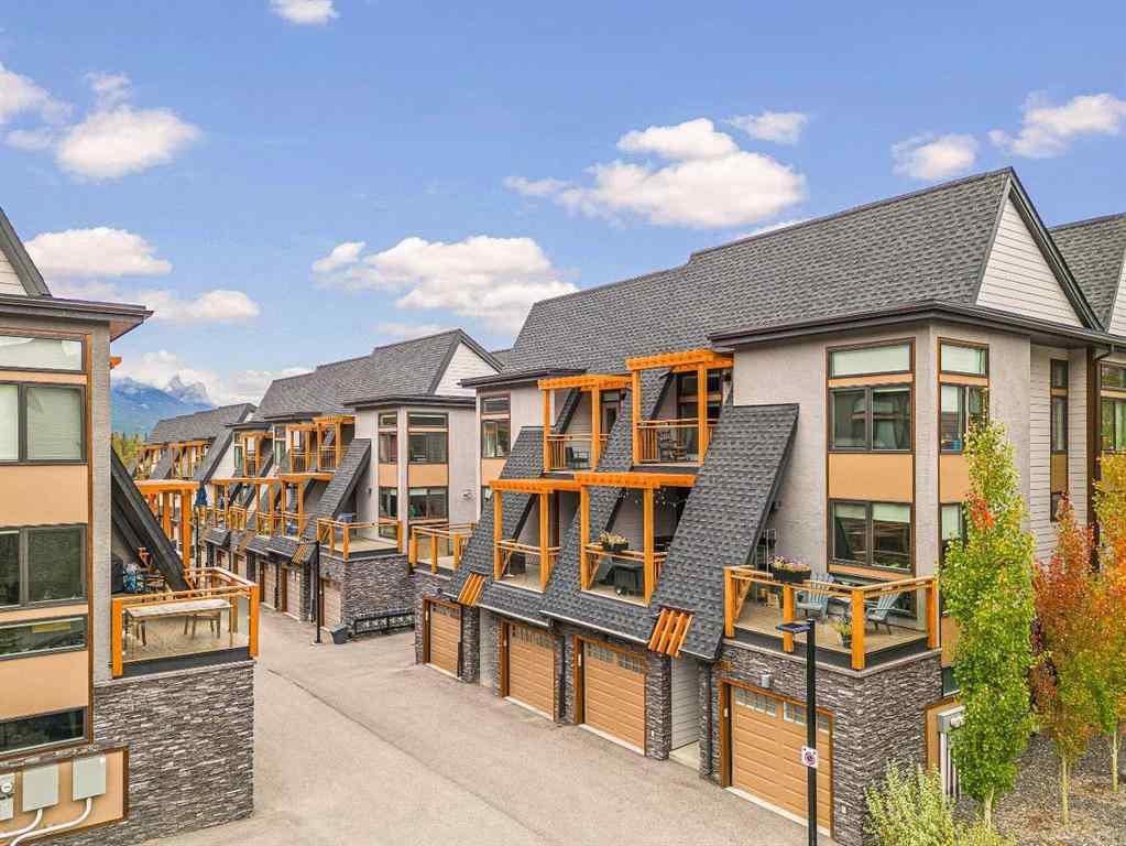MLS® A2265553 - Unit #302 102 Stewart Creek Rise  in Three Sisters Canmore, Residential