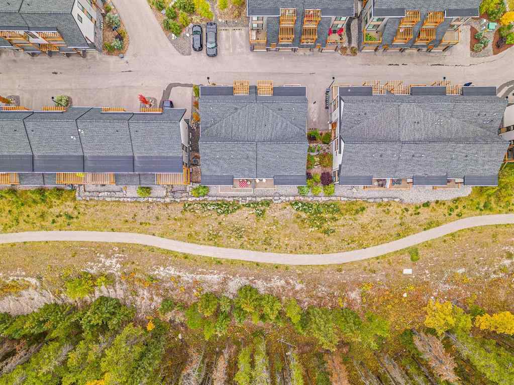 MLS® A2265553 - Unit #302 102 Stewart Creek Rise  in Three Sisters Canmore, Residential