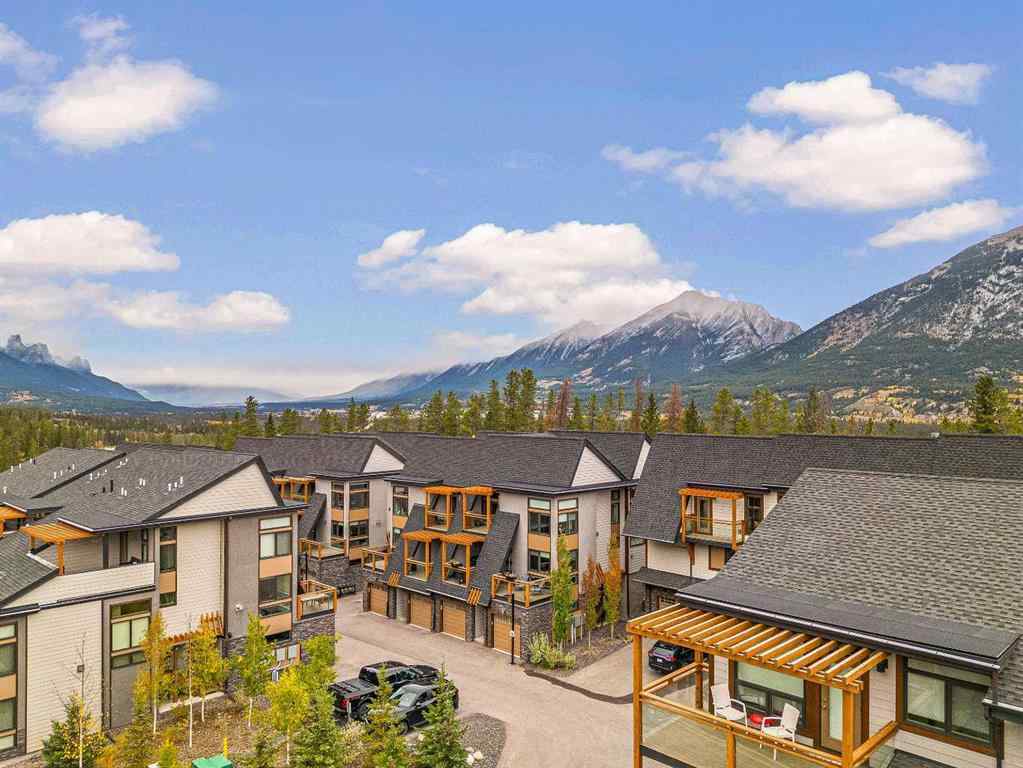 MLS® A2265553 - Unit #302 102 Stewart Creek Rise  in Three Sisters Canmore, Residential
