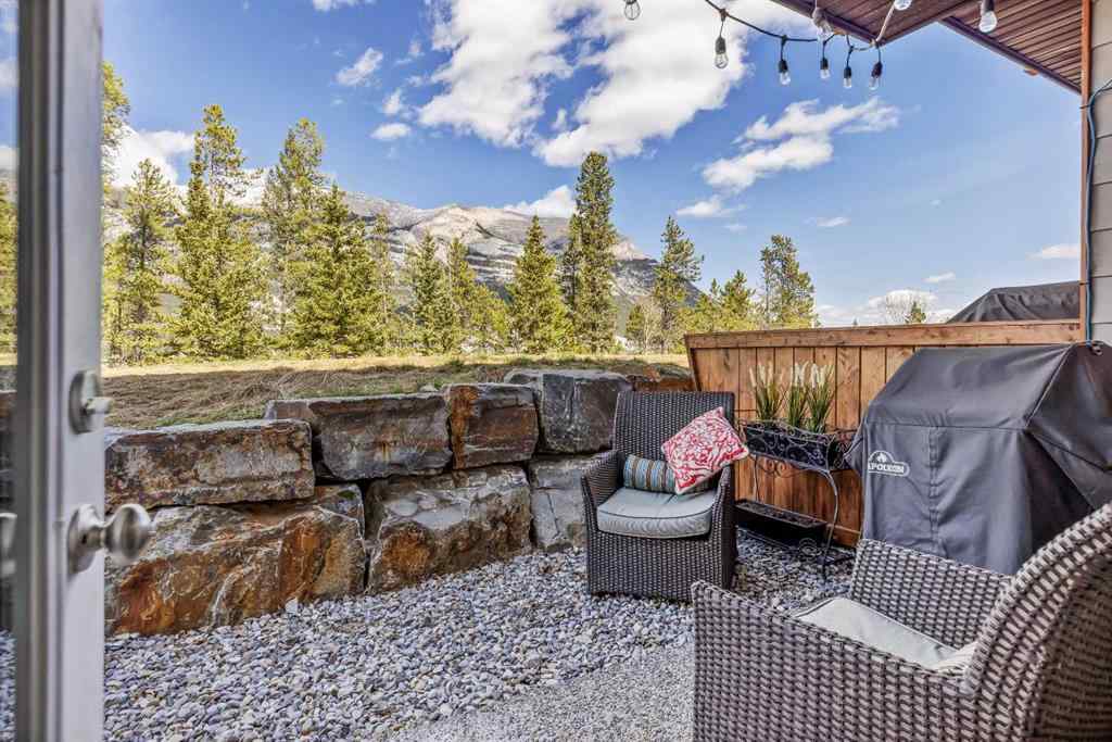 MLS® A2265553 - Unit #302 102 Stewart Creek Rise  in Three Sisters Canmore, Residential
