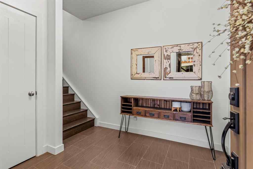 MLS® A2265553 - Unit #302 102 Stewart Creek Rise  in Three Sisters Canmore, Residential