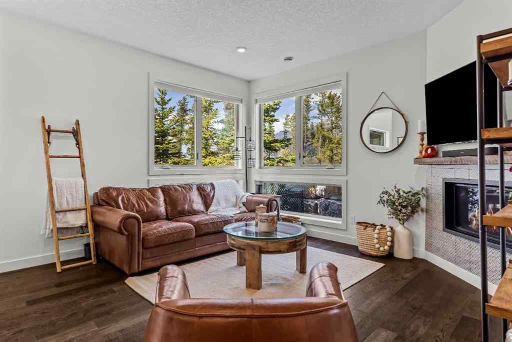 MLS® A2265553 - Unit #302 102 Stewart Creek Rise  in Three Sisters Canmore, Residential