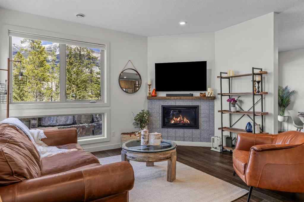 MLS® A2265553 - Unit #302 102 Stewart Creek Rise  in Three Sisters Canmore, Residential