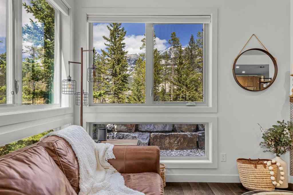 MLS® A2265553 - Unit #302 102 Stewart Creek Rise  in Three Sisters Canmore, Residential
