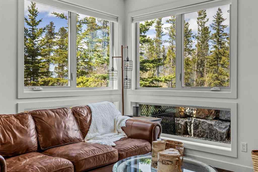 MLS® A2265553 - Unit #302 102 Stewart Creek Rise  in Three Sisters Canmore, Residential