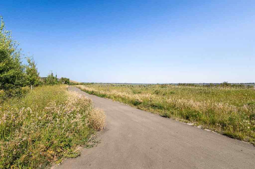 MLS® A2265561 - 33 Walcrest Way SE in Walden Calgary, Residential